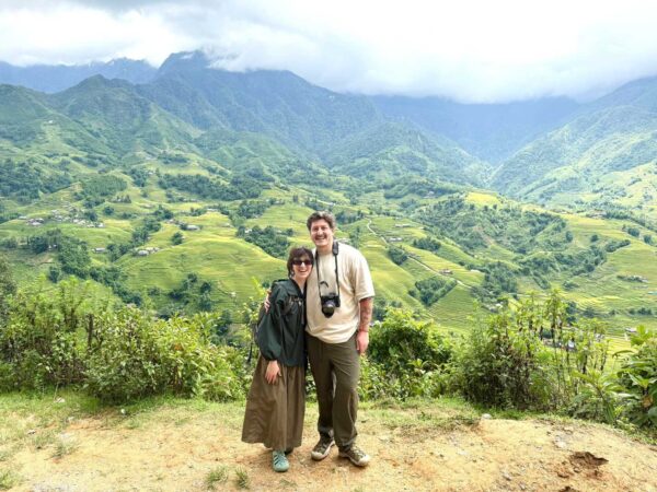 two tourists and behind is terrces riice fields