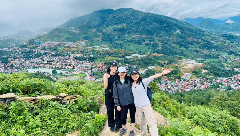 Three people trekking on the Sapa The Hidden Trail Trek